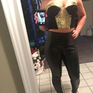 Black and gold corset top.